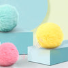 A collection of fluffy, round toys in light blue, yellow, and pink, demonstrating realistic chirping, touch-activated sound, 