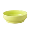 A light lime green ceramic cat and dog bowl with a matching stand.