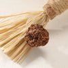 A bundle of natural silvervine cat chews and dental health toys tied with twine.