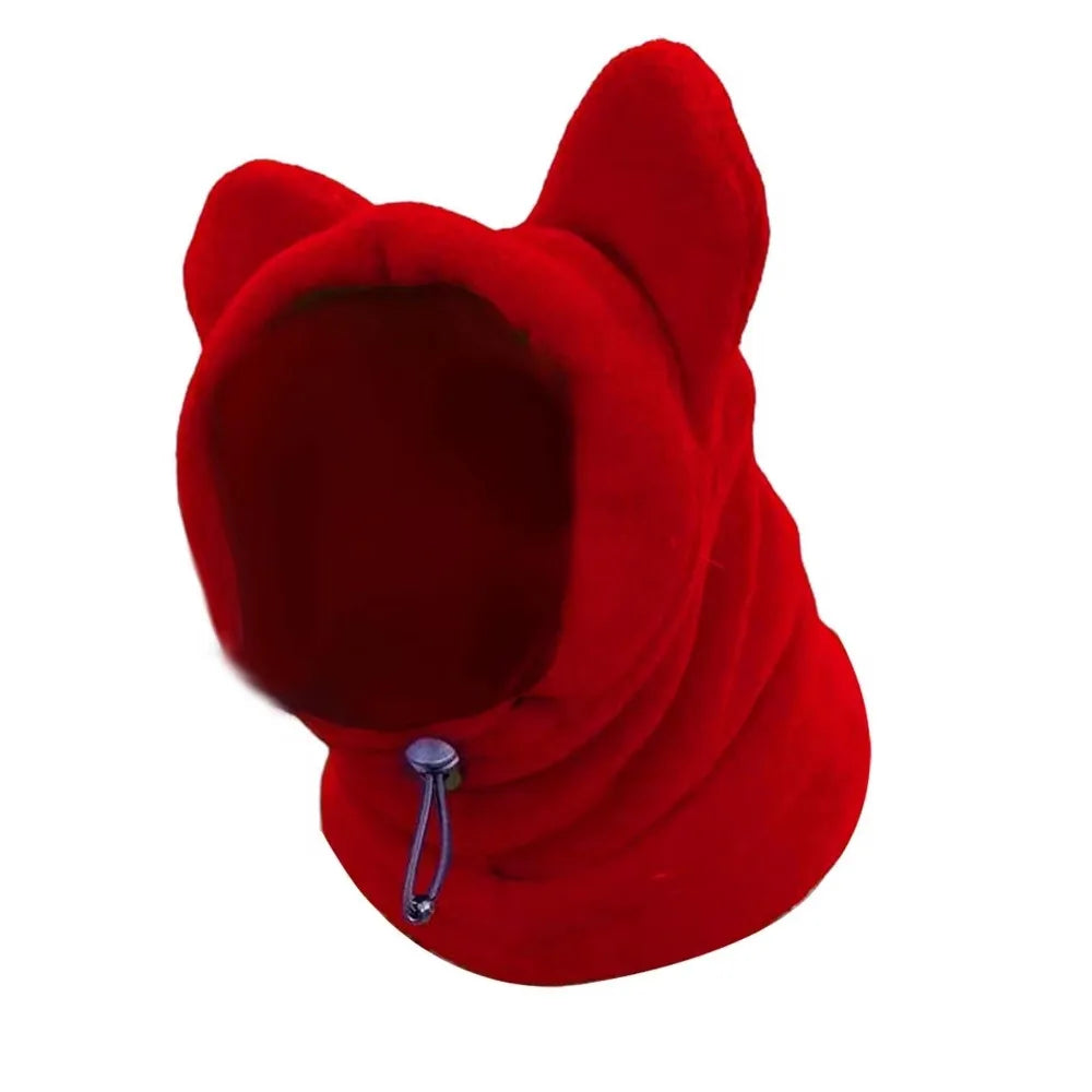 A bright red fleece dog winter hat with a hood shown from the front.