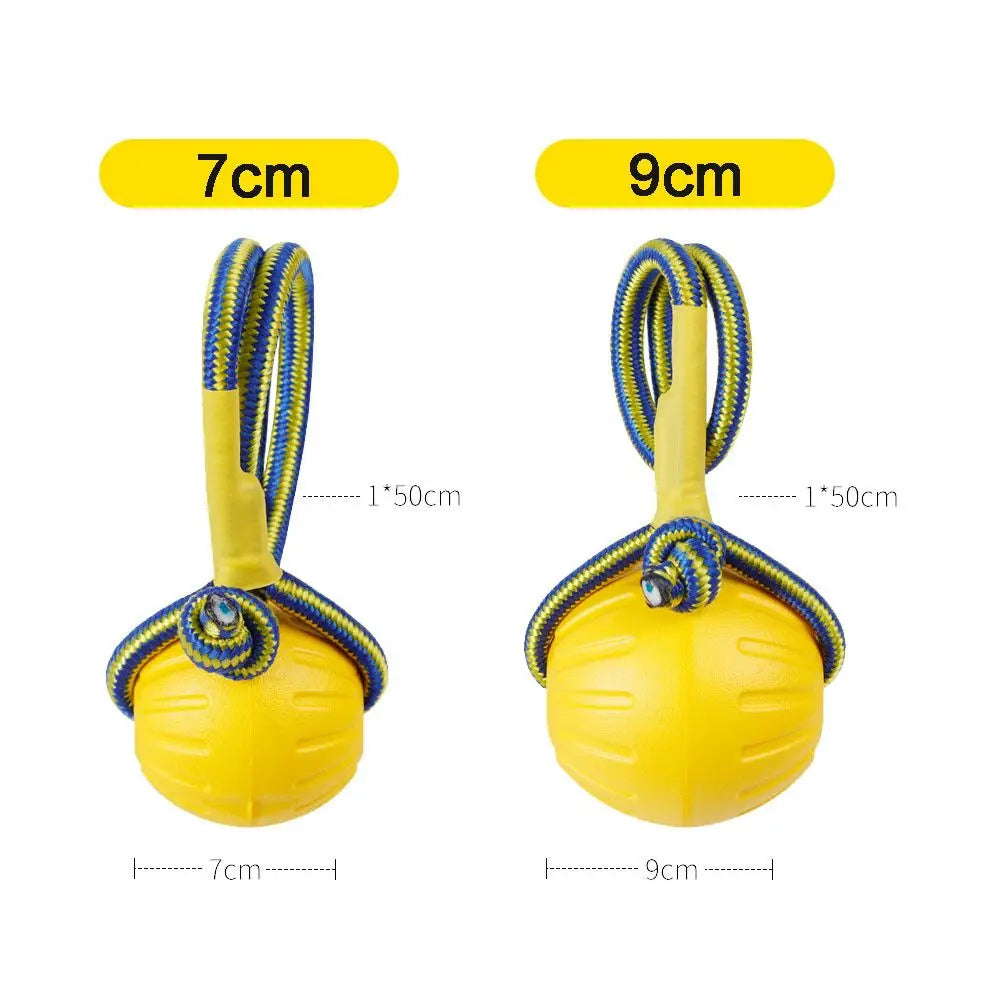 Two yellow rubber fetch balls for dogs, one measuring 7cm and the other 9cm.