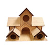 Handmade wooden bird house with a peaked roof and arched entrance for outdoor decor
