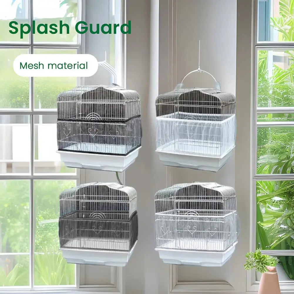 Three mesh material bird cages with white bottoms are displayed hanging in a window frame.