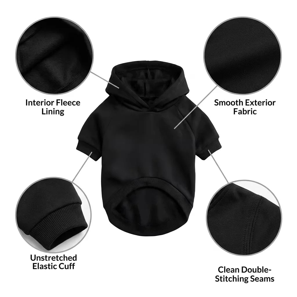 Black dog hoodie showing interior lining, smooth exterior fabric, elastic cuff, and double-stitching seams.
