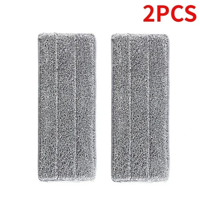 Two reusable microfiber mop pads with textured gray surfaces.