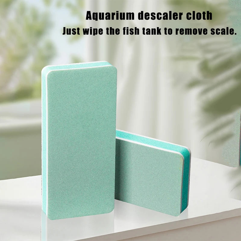A teal aquarium descaler cloth and a matching cleaning block are shown on a white surface.