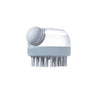A light blue soft silicone pet bath brush with a clear shampoo dispenser.