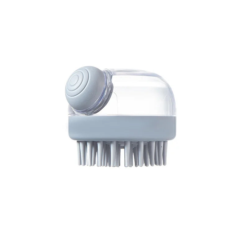 A light blue soft silicone pet bath brush with a clear shampoo dispenser.