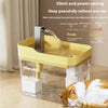 A clear glass automatic cat water fountain with a yellow base and a stainless steel pump is shown next to a cat.