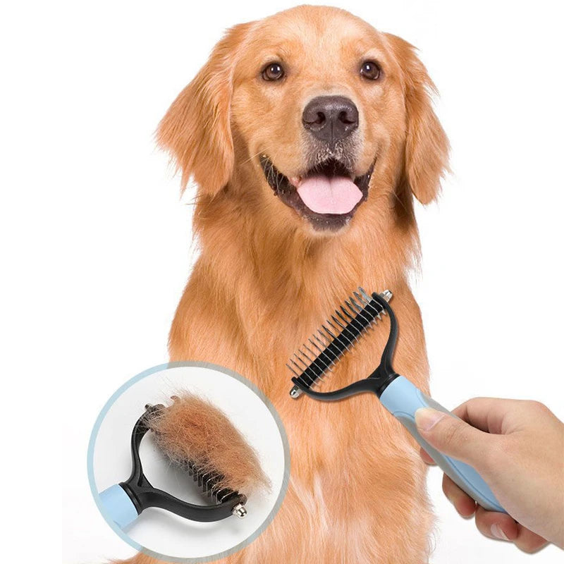 A hand holds a professional pet deshedding brush being used on the coat of an orange-colored dog.