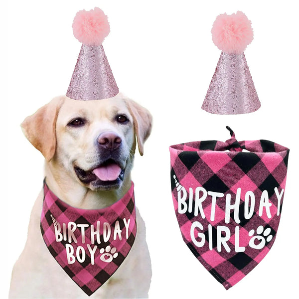 A golden retriever wearing a pink and black plaid birthday bandana with a pink pom-pom.