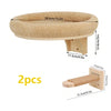 Wall-mounted cat tree with a round scratching surface and wooden stairs for climbing