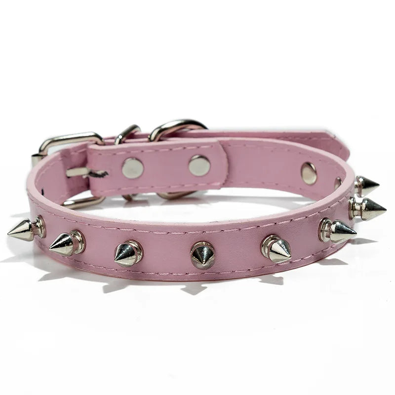 Pink studded leather dog collar with metal rivets and a silver buckle.