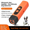 An orange ultrasonic dog repeller device shown against a white background.