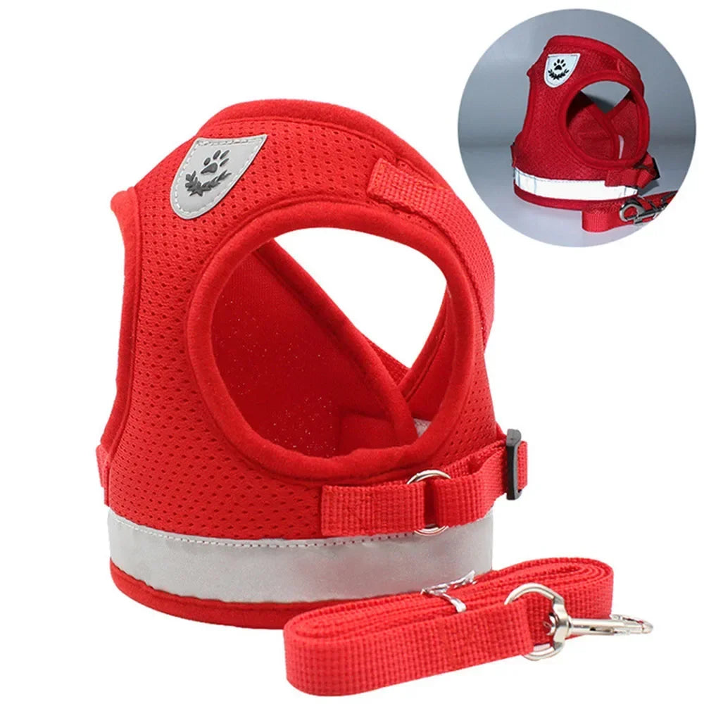 Red adjustable reflective mesh harness for cats and small dogs with a leash
