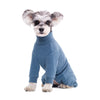 Un traje de abrigo de forro polar térmico azul claro para perro con orejas peludas mirando a la cámara.