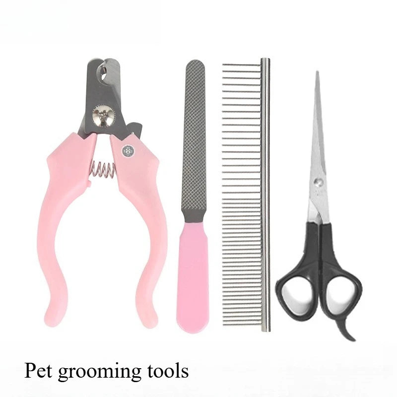 A set of pink pet grooming tools including a clipper, comb, and scissors.