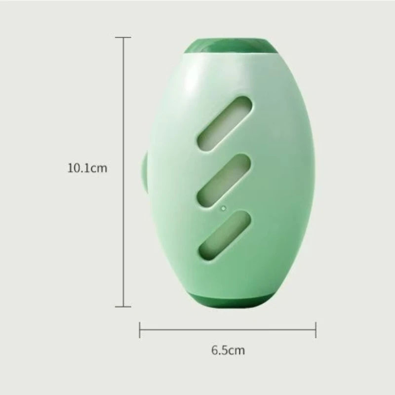 A light green reusable lint roller with a rounded, oval shape and three rectangular openings.