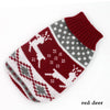 A knitted red deer sweater featuring a white and gray patterned design.