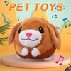 A fluffy brown dog toy with pink nose and white paws sitting on a light pink surface.