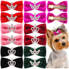 A collection of glitter hair bows and clips in various colors like pink, red, purple, and green, displayed next to a dog's fa