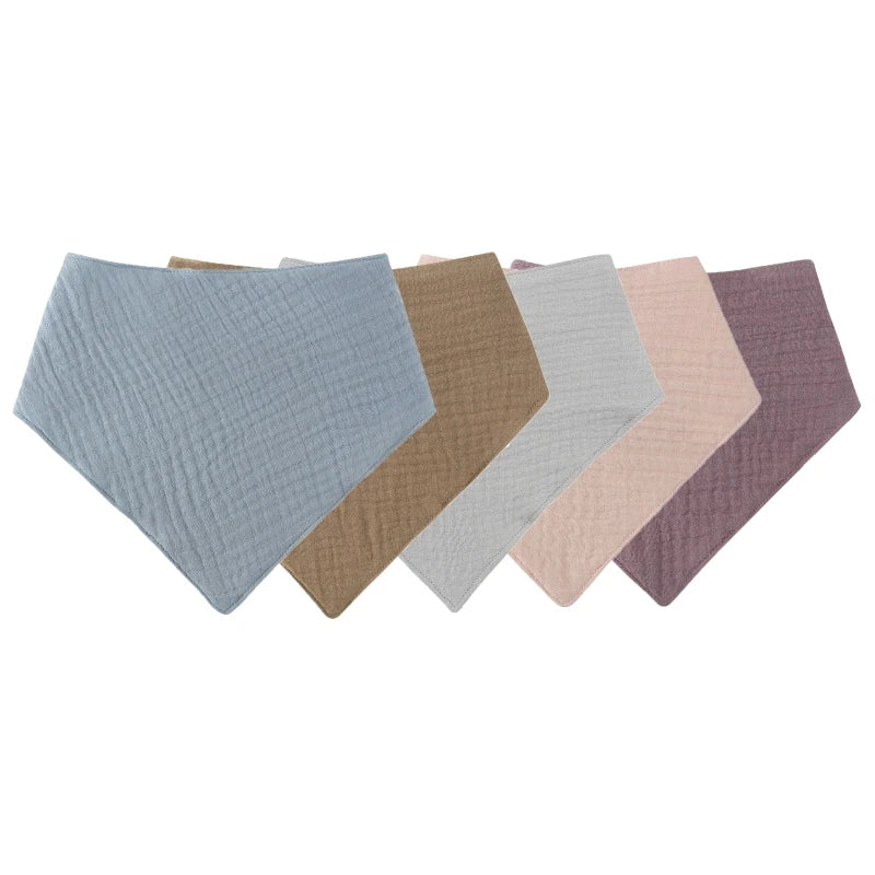 A pack of five soft cotton baby bibs in various muted pastel and earth tones.