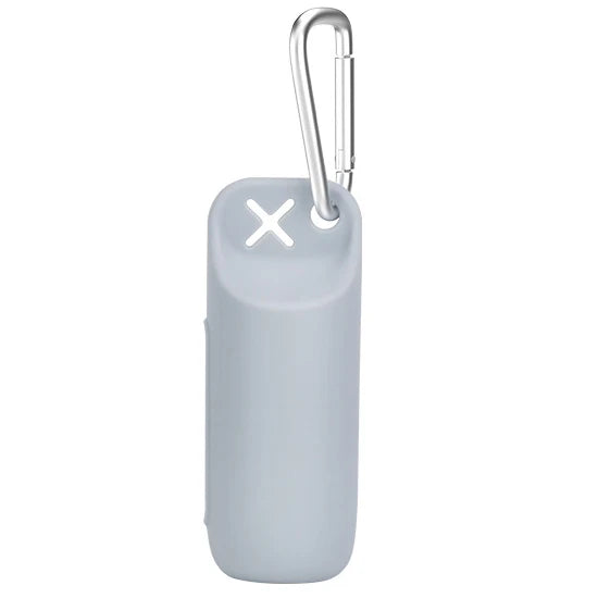 A light gray silicone dog poop bag dispenser with a metal clip.