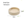 A light wood feeding bowl with a diameter of 8cm and a depth of 2cm.