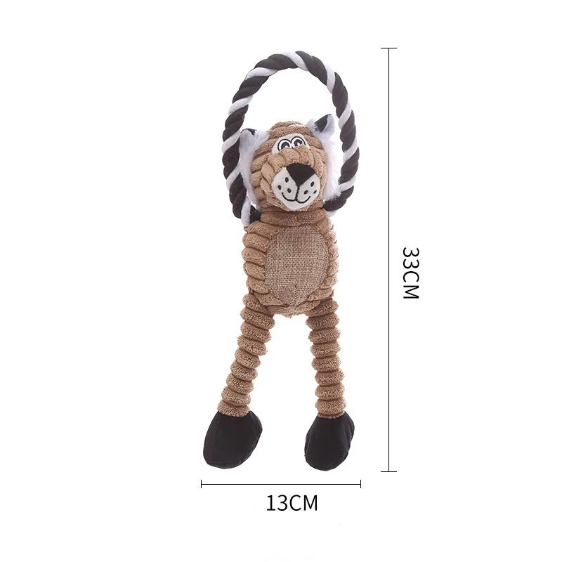 A brown and white plush toy shaped like a lion's head with black and white striped ears and a black and white striped mane.