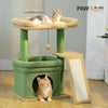 A compact cat tree with sisal scratching posts and cozy perches featuring green and beige textures.