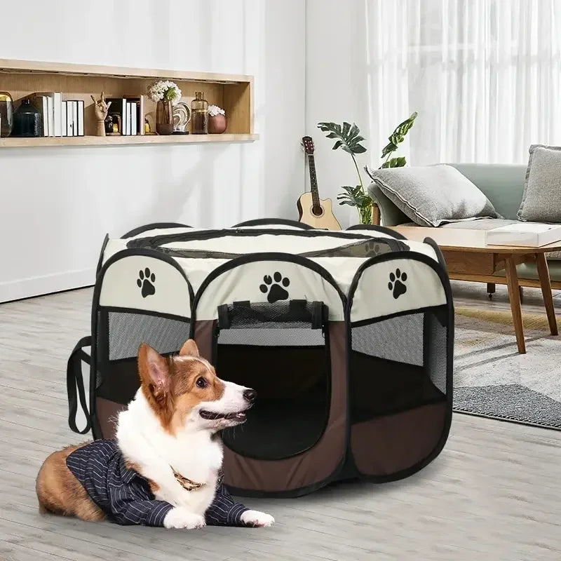 A small dog is lying down inside a portable foldable pet playpen with a black and gray fabric.