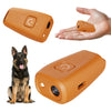An orange ultrasonic dog bark deterrent device shown in various angles, including a hand holding the product and next to a do