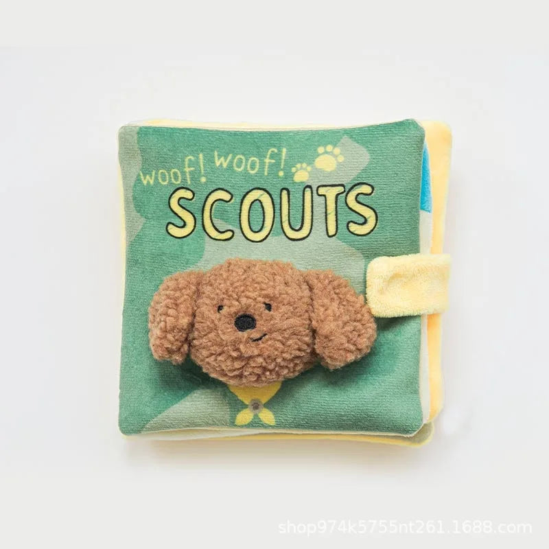 A soft green fabric toy with yellow trim and text that reads Woof woof Scouts