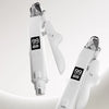 A white 2-in-1 pet nail clipper and grinder with a LED illuminator is shown against a light background.