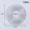 Twelve replacement activated carbon filters for a cat water fountain, circular and white.