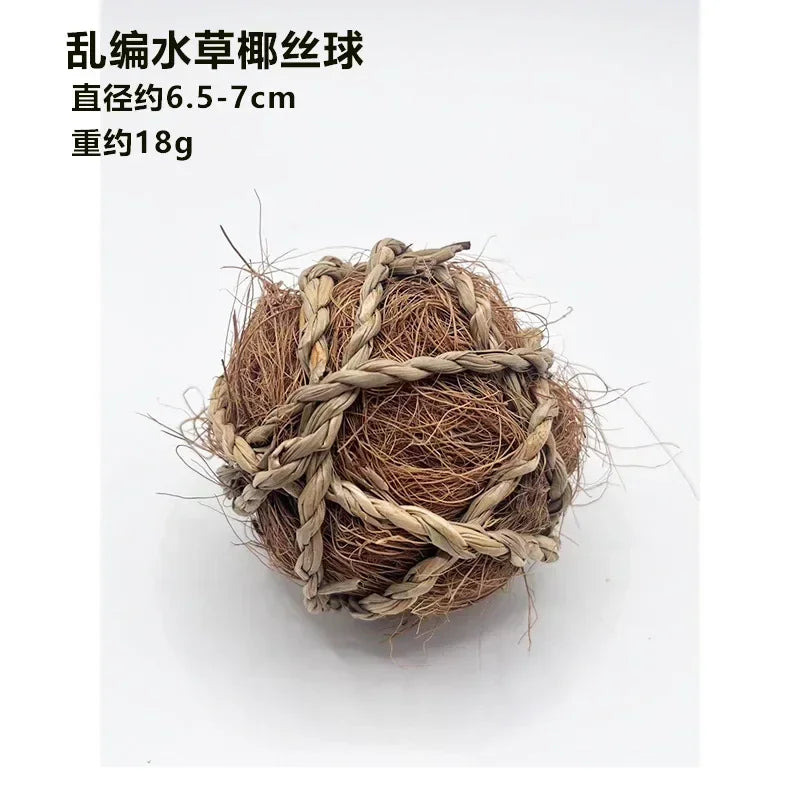 A ball made of natural grass and twine, used as a chew toy for small pets.