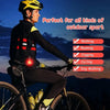 A person wearing a black and yellow cycling jersey is riding a bicycle outdoors with a waterproof LED pet collar light visibl