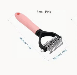 Small pink stainless steel pet grooming comb with a black handle and teeth