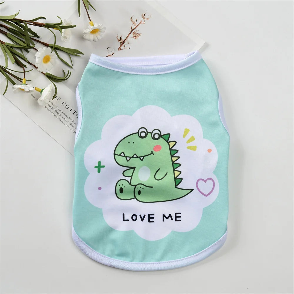A light mint green sleeveless vest for pets featuring a cute green dinosaur design and the text Love Me