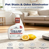 A white bottle of Pet Stain & Odor Eliminator spray next to a lemon, demonstrating its use for cleaning pet stains and odors.