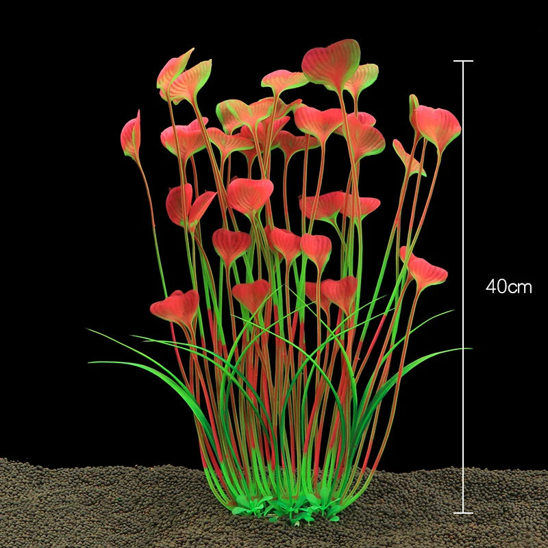 Plantes décoratives aquatiques artificielles avec des feuilles roses et rouges vives, poussant à partir d'une base verte.