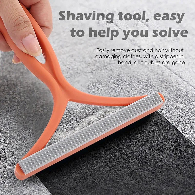 An orange shaving tool with a rubber strip is shown being used to remove dust and hair from fabric.