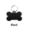 Black personalized bone-shaped dog ID tag with a metal keyring.