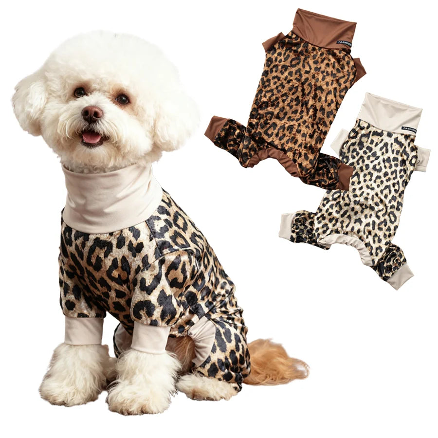 A fluffy white dog wearing a leopard print pajama set with brown accents.