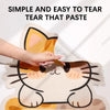 A hand is tearing a paste-like material from a cat-shaped fabric, demonstrating how simple and easy it is to tear that paste.