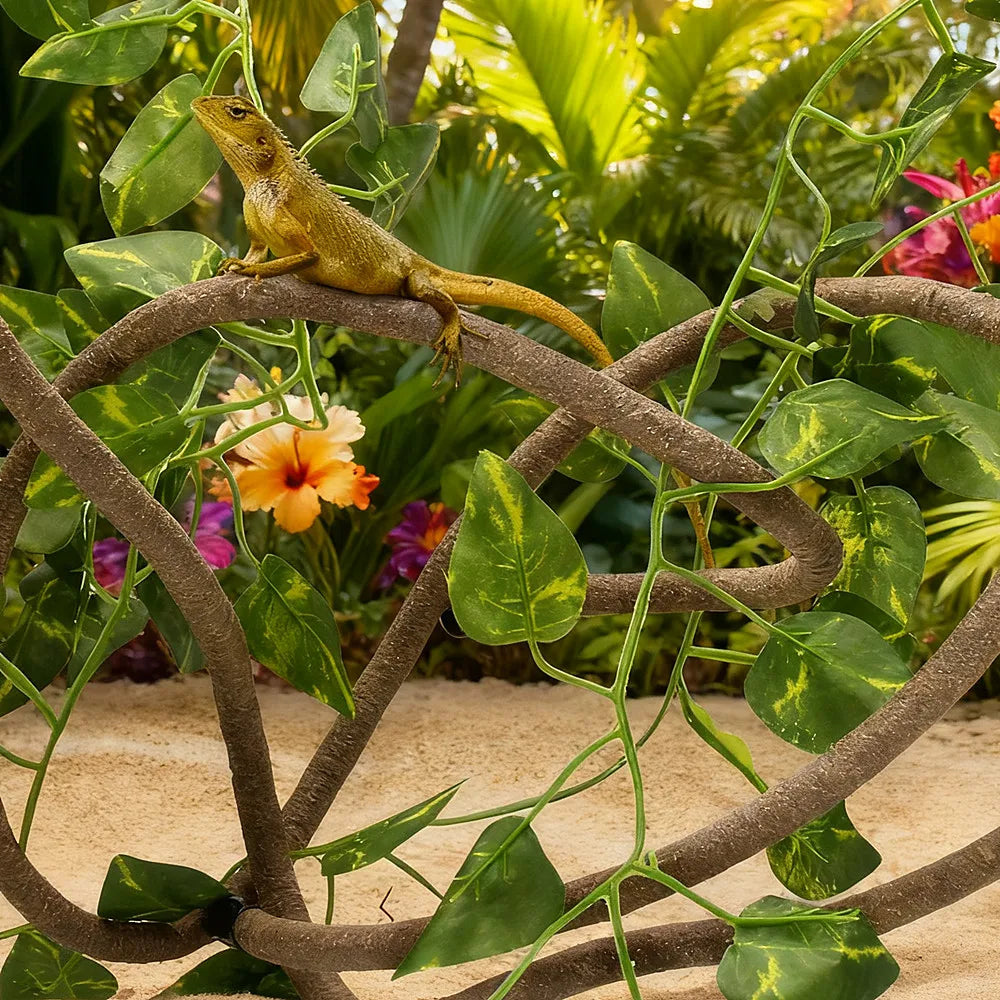 A small yellow lizard is perched on a woody vine with green leaves in a natural terrarium setting.