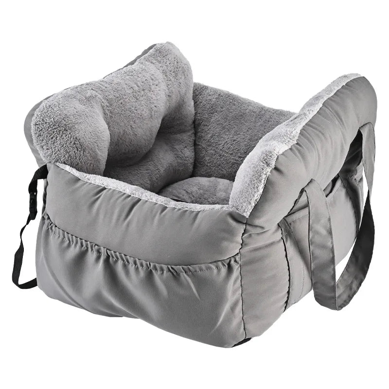 A gray durable pet car seat with a soft lining and safety straps.