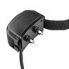 Black rechargeable dog training collar with a remote control attached and a nylon strap.