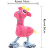 A pink plush squeaky donkey dog toy with yellow ears and blue feet.