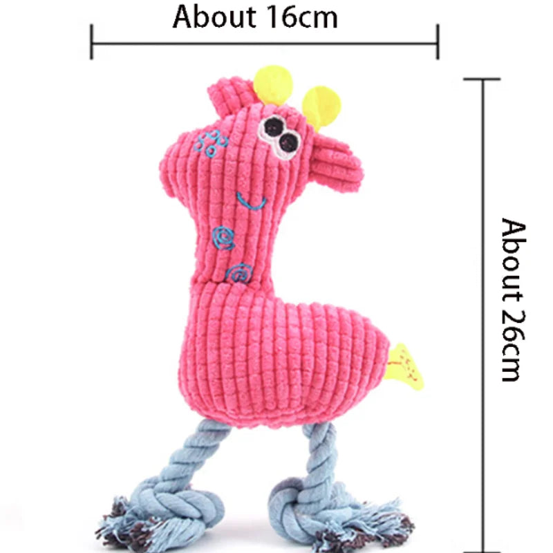A pink plush squeaky donkey dog toy with yellow ears and blue feet.